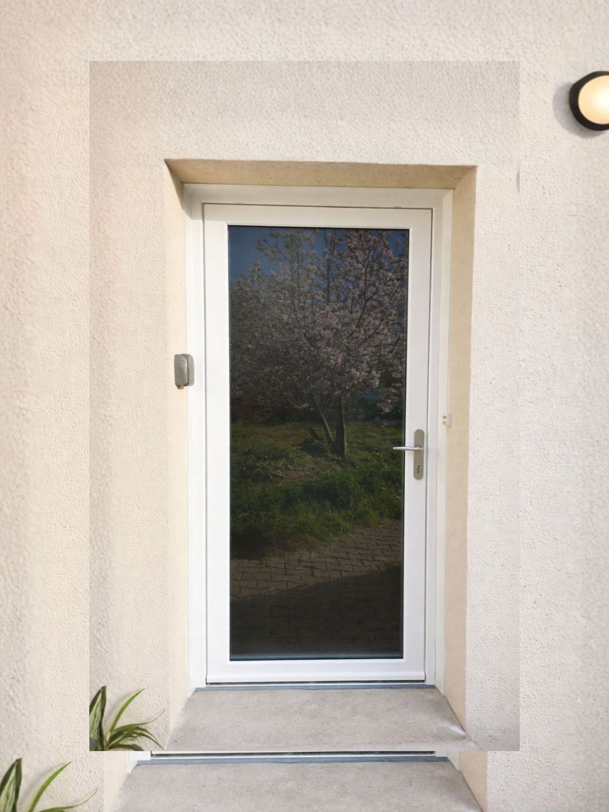 remplacement de porte d'entrée en porté vitrée PVC